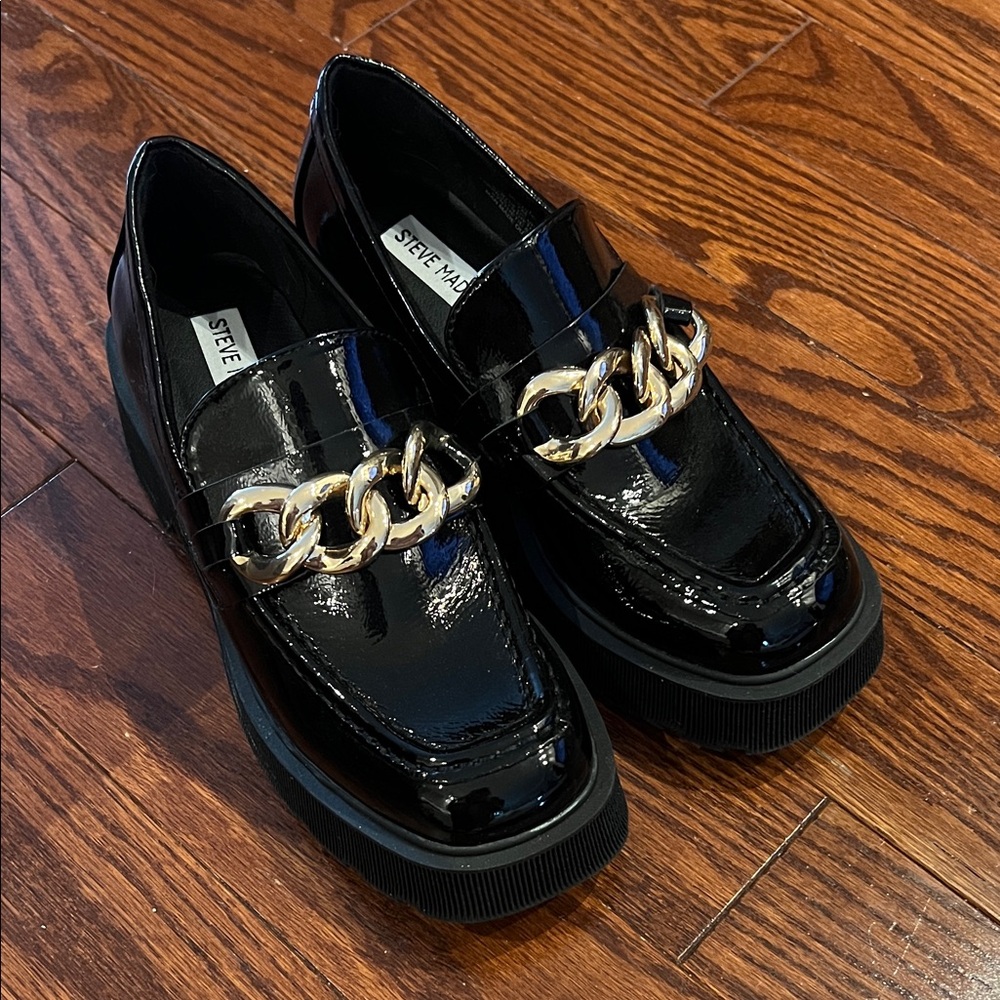 Steve Madden Glossy Black Loafers with Gold Chain Accent